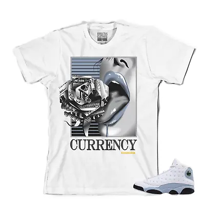 Tee To Match Air Jordan Retro 13 Blue/Grey Sneakers . Currency Tee • $22.50
