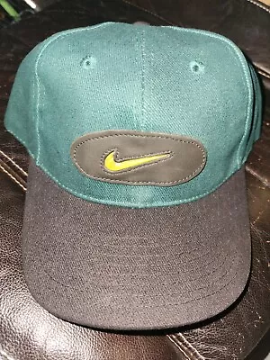 Vintage 90s Nike Swoosh Circle Logo Green Black Adjustable Strapback Hat • $30