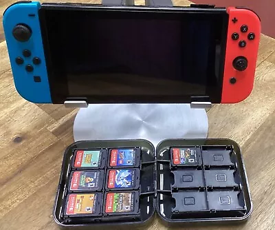 !!! Nintendo Switch With Neon Blue And Neon Red Joy Con Bundle & 7 Games !!! • $275