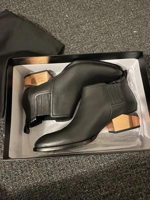 $800 • Buy Alexander Wang Kori Cut Out Heeled Ankle Boots (ROSE GOLD)