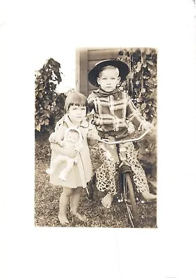 Children Photograph Girl With Doll Cowboy Tricycle Cute Hat Chaps 1940s 5 X 7 • $18.99