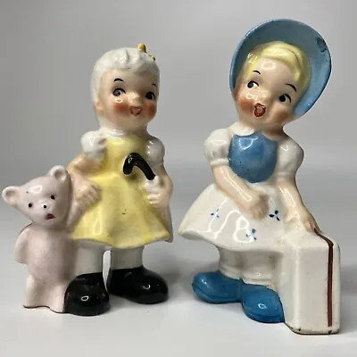Ucagco Vtg Figurine Set Of 2 Girls Yellow Teddy Bear Blue Bonnet Suitcase READ • $18.95