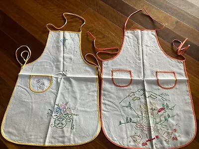 2 Vintage Cotton Hand Embroidered Flower Cart  Swiss Girl Child’s Full Aprons • $25