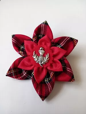 RED (ROYAL STEWART)TARTAN FABRIC BROOCH. RED INNER FLOWER. SILVER THISTLE.  9cm  • £8.75