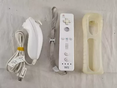 Genuine Nintendo Wii Remote Wiimote Controller With Nunchuck (White)  • $30