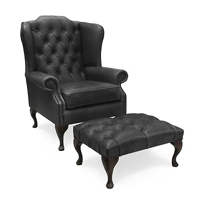 Chesterfield High Back Wing Chair & Footstool Presented In Vintage Black Leather • £875
