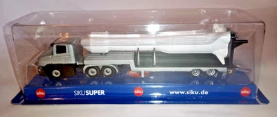 £7.95 • Buy SIKU 1614 Silver SCANIA LOW LOADER With ROCKET White NO TAMPO MINT IN BLISTER