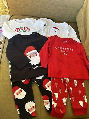 4 Sets Of Christmas Themed Baby Pyjamas 3/6 Months • £3.50