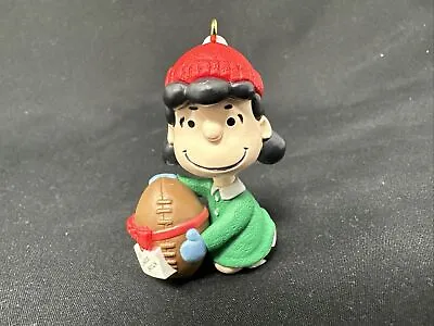 Vintage Charlie Brown Lucy Holding Football Christmas Ornament Hallmark MINT • $10.95