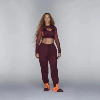 $120 • Buy Adidas Ivy Park Trackpants Maroon/Amazon Red/Solar Orange FW19.
