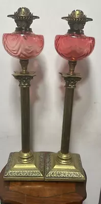 A PAIR OF LARGE EDWARDIAN BRASS OIL LAMPS WITH CRANBERRY GLASS BOWLS 96cm H • £11.50