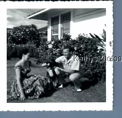 Found B&w Photo A_8929 Man And Pretty Woman In Dress Crouching By Dog • $3.98