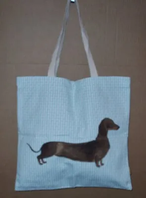 Milly Green Dachshund Dog On A Blue With White Bone Background Cotton Tote Bag • $18