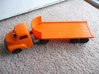 Vintage Hubley Kiddie Toy  Orange Plastic Ford Log Truck Tractor Trailer • $15