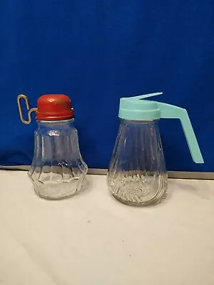 Vintage Red Metal Top Nutcracker And Maple Syrup Glass Containers • $26