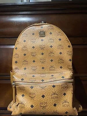 MCM Backpack Cognac • $325