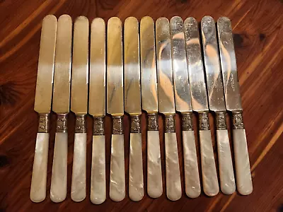 Landers Frary & Clark Mother Of Pearl Sterling Silver S Banded knives Set Of 12 • $89.95