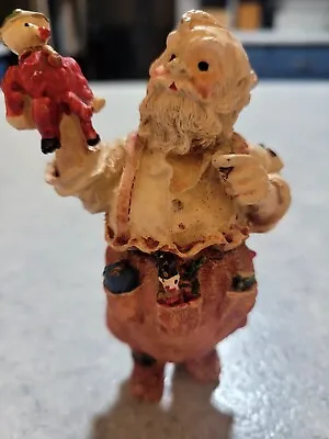 Midwest Importers Of Cannon Falls Christmas Santa Holding A Doll & Brush  • $15