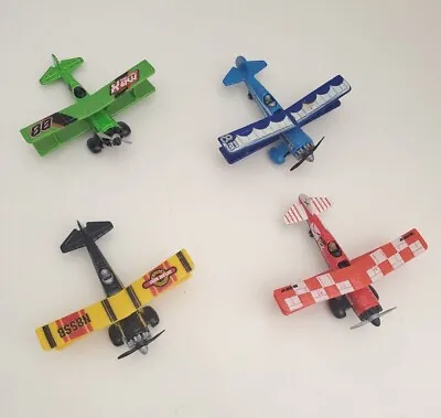 Lot Of 4 Matchbox Skybusters Diecast Airplane	Bi-Plane In Green Blue Black & Red • $19.85