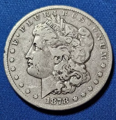 1878-cc Morgan Silver Dollar Circulated Mid Grade. • $113