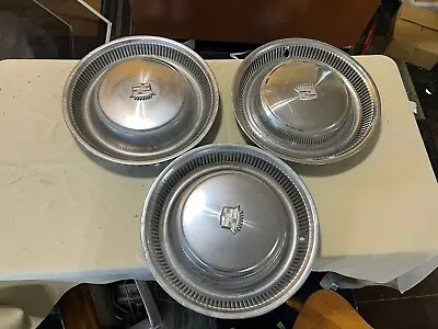 Vintage Cadillac Hubcaps • $0.99