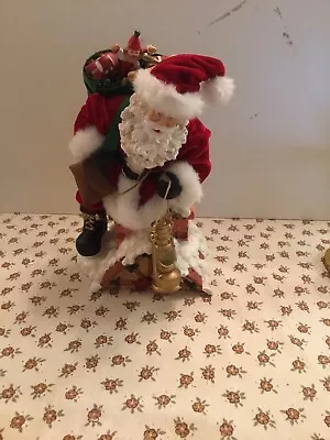 Father Christmas Figure • £5