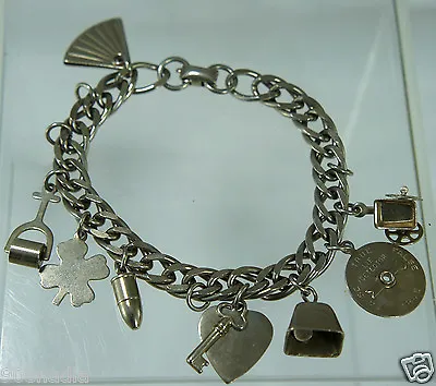 Vintage Silver Tone Charm Bracelet Signed Kent W/heartkeyfanbulletshamrock • $42