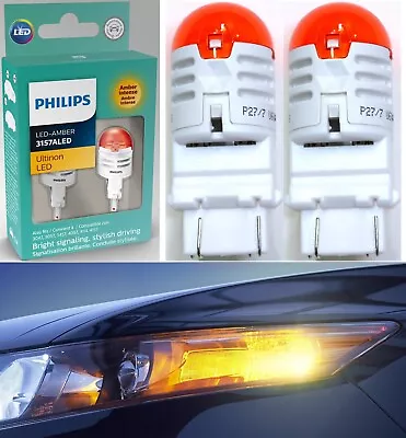 Philips Ultinon LED Light 4157 Amber Orange Two Bulbs DRL Daytime Replacement • $25.65