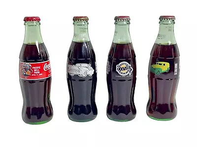 Set Of Four Collectible Unopened Coca Cola Bottles Lot Of 4 Different Bottle 8oz • $30