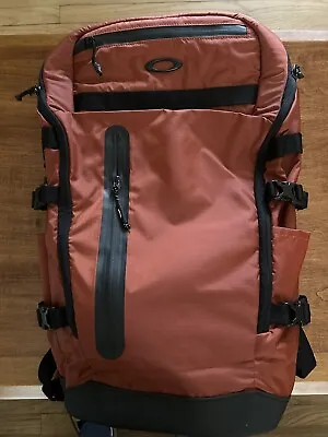 Oakley 20L Outdoor Backpack Travel Bag Brick Orange  • $60