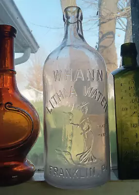 WHANN LITHIA WATER FRANKLINPA EMB WOMAN AT SPRINGS 1890s BLOB TOP BOTTLE • $80