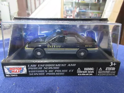 1:43 Motormax 1986 Ford Taurus Police Sheriff • $14.99