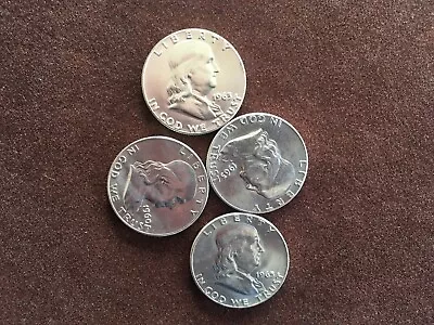 4---1963  Gem     Bu Franklin Half Dollars • $68.88