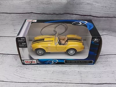 1:24 Maisto 1965 Shelby Cobra 427 Yellow Diecast Car Premiere DC Unopened • $18.50