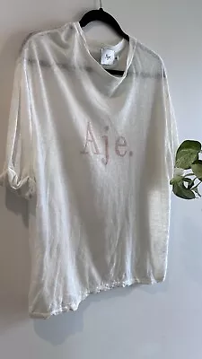 Aje. White Top Size M • $55