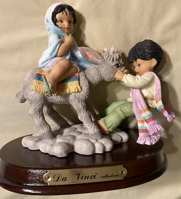 Rare DA VINCI COLLECTION Boy And Girl With Donkey Porcelain Figurine Wood Base • $49.99