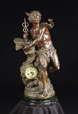 After L & F Moreau. A 19th Century Bronzed Spelter Figural Clock. The Movement W • $10000