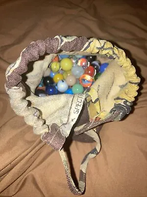 LOT OF ASSORTED VINTAGE MARBLES WITH Pouch • $25