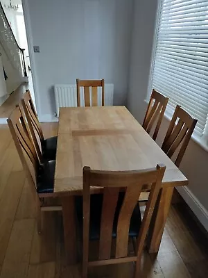 Extending Solid Oak Dining Table And 6 Chairs • £100