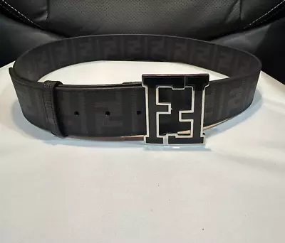 BLACK MONOGRAM FENDl BELT HAS BLACK BUCKLE WITH SILVER TRIM • $125