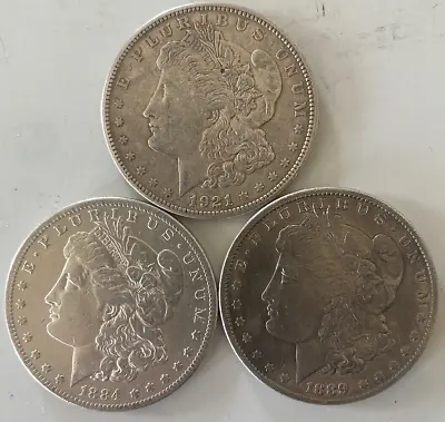 Lot Of Three Morgan Silver Dollars. • $124.99