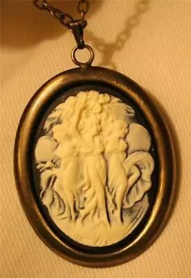 Lovely Sloped Brasstone Rim Navy Blue And Cream 3 Dancing Muses Pendant Necklace • $13.49