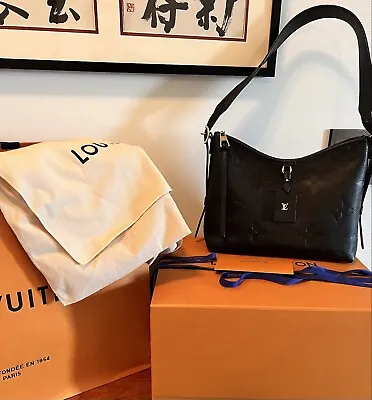 Louis Vuitton CarryAll Pm Bag  • $2399
