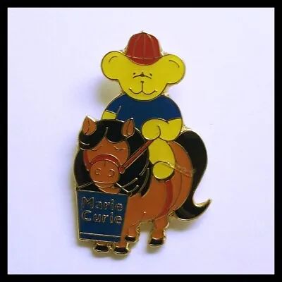 Marie Curie Cancer Care Charity Pin Badge Bear On Horse • £2.99