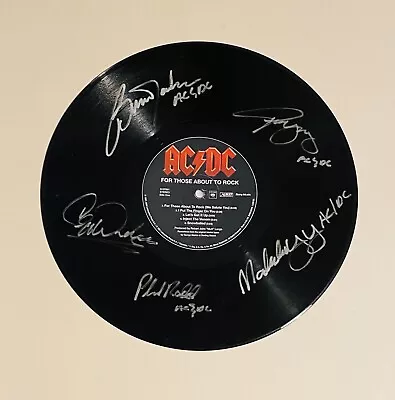 AC/DC Autographed Vinyl Record • £50