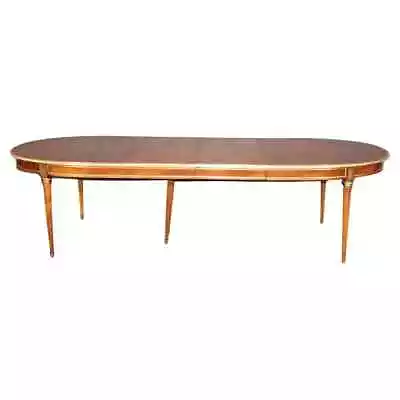 Fine Manner Jansen Burled Walnut Bronze And Brass Trimmed Oval Dining Table • $7160