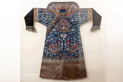 A Rare Qing Dynasty Embroidered Silk Dragon Robe With Matching Collar Framed.  • $48500