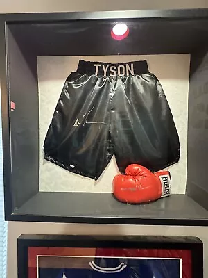 Mike Tyson Heavy Weight Autographed Trunks(JSA) & Left Glove “Iron Mike” (PSA) • $2500