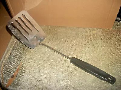 Vintage Foley Slotted Spatula With A Black Plastic Handle 12  Long USA • $12.99