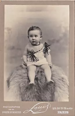 Cabinet Card Child On Fur Mat Wearing  Amber Beads • $4.05